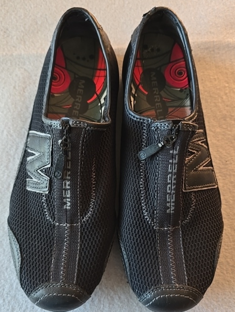 Merrell women's slip-on sneakers. These lightweight, sporty mesh Comfort Size 7